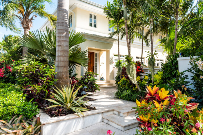 A porch covered in native landscape is one of the best Florida home design ideas.